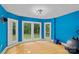 Bright bonus room features large windows, natural light, and hardwood floors at 15724 Eagleview Dr, Charlotte, NC 28278