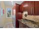 Well-equipped laundry room features modern appliances, sleek countertops, and ample cabinet storage at 15724 Eagleview Dr, Charlotte, NC 28278