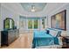 Serene main bedroom with tray ceilings, large windows, and a calming color palette at 15724 Eagleview Dr, Charlotte, NC 28278