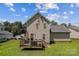 View of backyard with a deck perfect for outdoor relaxation and entertaining under the open sky at 2040 Brantley Creek Dr, Kannapolis, NC 28083