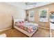 Cozy bedroom with carpet, light-colored walls, and bright windows with blinds at 2040 Brantley Creek Dr, Kannapolis, NC 28083