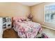 Charming bedroom featuring a pink-themed decor, perfect for a young  at 2040 Brantley Creek Dr, Kannapolis, NC 28083