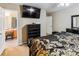 Comfortable primary bedroom with a TV, closet, and ensuite bathroom access at 2040 Brantley Creek Dr, Kannapolis, NC 28083