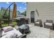 Enjoy outdoor living with a patio set, grill, and umbrella, great for entertaining at 2040 Brantley Creek Dr, Kannapolis, NC 28083