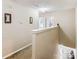 Upstairs hallway featuring carpet, light-colored walls, and white trim at 2040 Brantley Creek Dr, Kannapolis, NC 28083