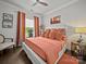 Inviting bedroom with hardwood floors, decorative curtains, and an abundance of natural light at 217 Turtleback Rdg, Weddington, NC 28104