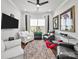 Cozy living room with comfortable seating, a large window, and stylish decor at 217 Turtleback Rdg, Weddington, NC 28104