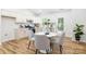 Cozy dining area with modern table and chairs, adjacent to the kitchen at 3100 Hickory Grove Dr, Monroe, NC 28110