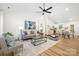 Bright living room with modern decor, vaulted ceilings, and an open floor plan at 3100 Hickory Grove Dr, Monroe, NC 28110