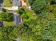 Aerial view of the property showcasing the home, gazebo, shed, expansive yard, and surrounding trees at 324 Swamp Fox Dr, Fort Mill, SC 29715