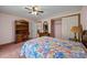 Cozy bedroom featuring a bed, dresser, built in desk and closet at 324 Swamp Fox Dr, Fort Mill, SC 29715