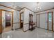 Welcoming tiled foyer with white walls and access to the bathroom and bedroom at 324 Swamp Fox Dr, Fort Mill, SC 29715