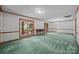 Spacious living room featuring large windows and elegant chandelier at 324 Swamp Fox Dr, Fort Mill, SC 29715