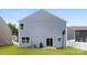 A well-kept backyard with a grill, patio, and basketball hoop at 3734 Stanley Creek Dr, Mount Holly, NC 28120