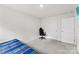 Spacious bedroom with neutral carpet, closet, and a blue gaming chair at 3734 Stanley Creek Dr, Mount Holly, NC 28120