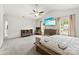 Spacious main bedroom with vaulted ceilings, soft carpet, and a ceiling fan at 3734 Stanley Creek Dr, Mount Holly, NC 28120