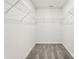 Spacious walk-in closet with ample wire shelving for organized storage at 3734 Stanley Creek Dr, Mount Holly, NC 28120