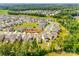 Aerial view of a neighborhood with lush greenery, and a clear view of 3855 Terski Dr highlighted at 3855 Tersk Dr, Midland, NC 28107