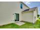 Exterior of home showcasing sliding glass door leading to the backyard at 3855 Tersk Dr, Midland, NC 28107