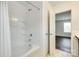Bright bathroom features white tiled tub and shower at 3855 Tersk Dr, Midland, NC 28107