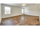 Bright bedroom features hardwood floor and large windows at 3855 Tersk Dr, Midland, NC 28107