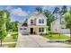 Charming two-story home with a well-manicured front yard, a covered porch, and an attached garage at 3855 Tersk Dr, Midland, NC 28107