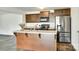 Modern kitchen with stainless steel appliances, a kitchen island with dark wood cabinets at 3855 Tersk Dr, Midland, NC 28107