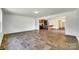 Spacious open-concept design features wood floors and plenty of natural light at 3855 Tersk Dr, Midland, NC 28107