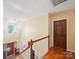 Bright foyer with hardwood floors, chandelier, and natural light at 394 E Goldmine Rd, Wadesboro, NC 28170