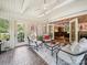 Relaxing sunroom with lots of natural light and views of the backyard at 394 E Goldmine Rd, Wadesboro, NC 28170