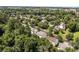 Aerial view of a residential neighborhood with tree-lined streets and well-maintained homes at 4519 Rock Stream Dr, Charlotte, NC 28269