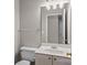 Bathroom featuring a single sink vanity and a mirror at 4519 Rock Stream Dr, Charlotte, NC 28269
