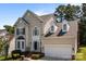 Charming two-story home with neutral siding, black shutters, and a well-maintained front yard at 4519 Rock Stream Dr, Charlotte, NC 28269