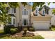 Beautiful two-story home featuring a manicured lawn and welcoming front entry at 4519 Rock Stream Dr, Charlotte, NC 28269