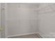 Walk-in closet with white metal shelving at 4519 Rock Stream Dr, Charlotte, NC 28269