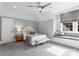 Cozy bedroom features neutral color palette, a window seat, recessed lighting, and plush carpeting at 4714 Ockley Manor Ln, Charlotte, NC 28226