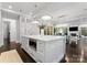 Open kitchen featuring marble countertops, large island, modern appliances, and ample storage space at 4714 Ockley Manor Ln, Charlotte, NC 28226