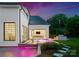 The backyard features a modern pool with a built-in hot tub, and an outdoor seating area at 4714 Ockley Manor Ln, Charlotte, NC 28226