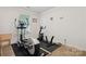 Functional bedroom featuring modern exercise equipment and abundant light, designed for fitness at 5019 Poplar Glen Dr, Matthews, NC 28104