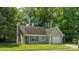 Charming single-story home with a manicured lawn, attached garage, and inviting front entrance at 5019 Poplar Glen Dr, Matthews, NC 28104
