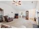 Spacious living room with high ceilings, ample natural light, and a welcoming, open layout at 5019 Poplar Glen Dr, Matthews, NC 28104