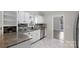 Updated kitchen featuring granite countertops, stainless steel appliances, and modern tile backsplash at 6017 Millbury Ct, Charlotte, NC 28211