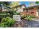 Backyard featuring a generator, landscaping, and a brick exterior at 6921 Thermal Rd, Charlotte, NC 28211