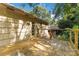 Spacious wooden deck with modern railings, offering an inviting outdoor living space with access to the house at 6921 Thermal Rd, Charlotte, NC 28211
