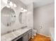Bathroom featuring double mirrors, a stylish vanity, and modern fixtures at 705 Torrey Pines Ln, Fort Mill, SC 29715