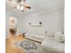 Comfortable living room showcasing light-filled space and neutral decor at 705 Torrey Pines Ln, Fort Mill, SC 29715