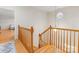 Wooden staircase leading to the upper level, enhancing the home's charm at 705 Torrey Pines Ln, Fort Mill, SC 29715