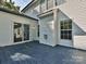 Expansive back deck with sliding glass door offering easy access to the outdoor space at 7309 Rock Hampton Ct, Harrisburg, NC 28075