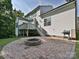 Spacious backyard with fire pit, deck and grill perfect for outdoor gatherings and relaxation at 7309 Rock Hampton Ct, Harrisburg, NC 28075