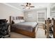 Neutral bedroom featuring a wooden bed frame, carpet and light colored walls at 741 Garrett Green Way # 64, Fort Mill, SC 29715